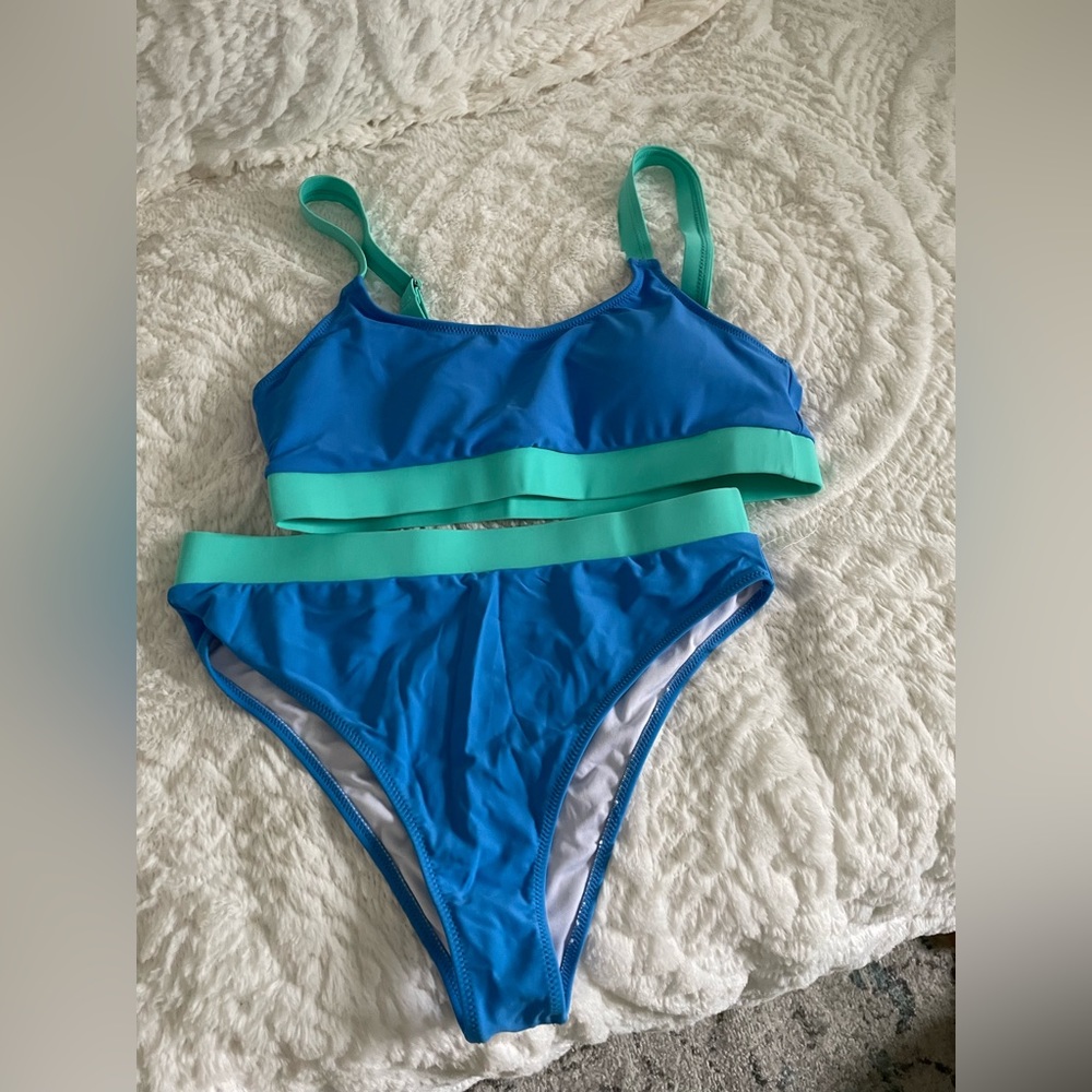 Size large high waisted swimsuit. Brand new.
